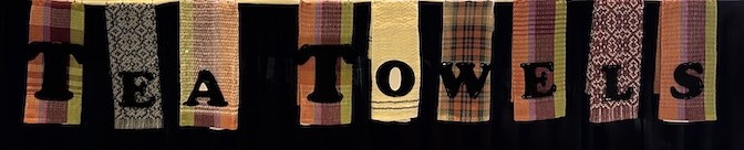 Row of nine hand woven towels hanging in front of a black background. Letters in the words TEA TOWELS are super imposed on the towels.